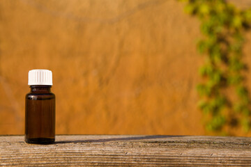 medicine bottle on wooden background