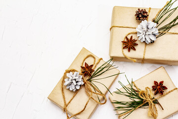 New Year or Christmas gifts with pine branches and cones as Zero waste concept