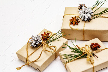 New Year or Christmas gifts with pine branches and cones as Zero waste concept