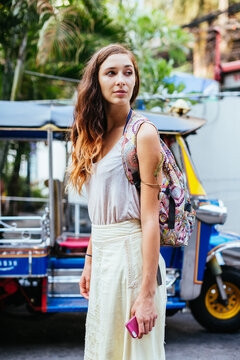 Beautiful woman walking in the city