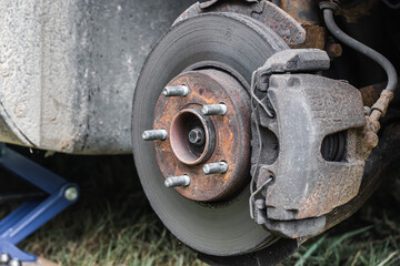 Rear wheel car suspension. Brake disc and wheel hub of a car. Stock photo