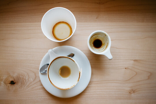 empty coffee dishes at cafe