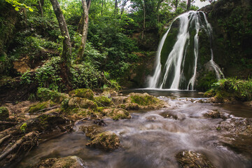 Obraz na płótnie Canvas Beautiful waterfall in the forest near village Donji Taor, near city of Valjevo in Western Serbia