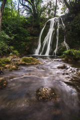 Fototapeta na wymiar Beautiful waterfall in the forest near village Donji Taor, near city of Valjevo in Western Serbia