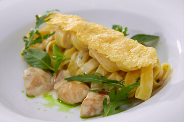 Tagliatelle with Mushroom, Cream Sauce, Truffle and Arugula