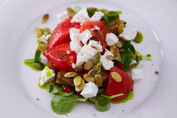 Greek vegetable salad with feta cheese. Shallow Dof.