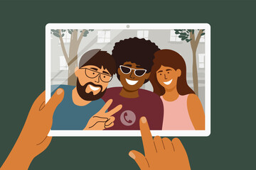 Fototapeta na wymiar Online video call of diverse people by digital tablet. Multiethnic group of person. Happy friends hug, greet and watch to device screen. Mobile app for meeting and talking remotely vector illustration