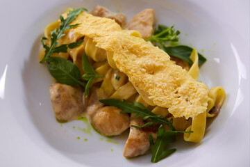 Tagliatelle with Mushroom, Cream Sauce, Truffle and Arugula