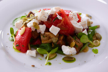 Greek vegetable salad with feta cheese. Shallow Dof.