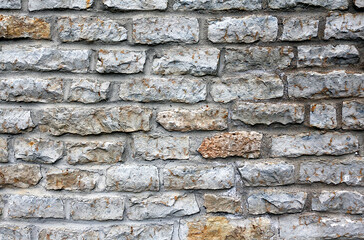 Old gray stone wall. Vintage background.