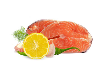 fresh trout steak with lemon, garlic and hot pepper on a white background