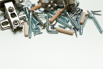 spare parts for furniture assembly top view. furniture fittings background with copy space. 