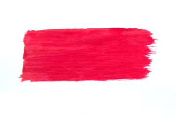 Red paint stroke on a white background