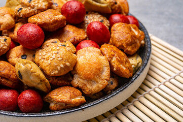 Tasty asian vegetarian appetizer, crunchy rice en peanuts snacks from Japan