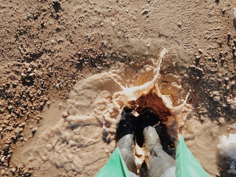 jumping in mud puddle