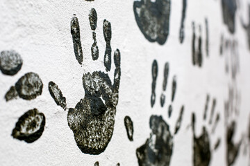 Hand-prints on a wall