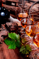 Tasting of aged french cognac brandy in old cellars of cognac-producing regions Champagne or Bois, France