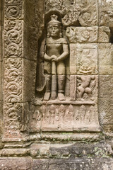 Gate of the gallery surrounded by two guards in Ta Som,  Siem Reap Cambodia