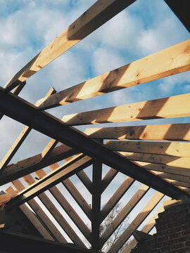 Blue sky through rafters
