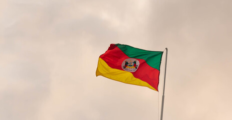 Flag of the Brazilian State of Rio Grande do Sul raised on the mast.
