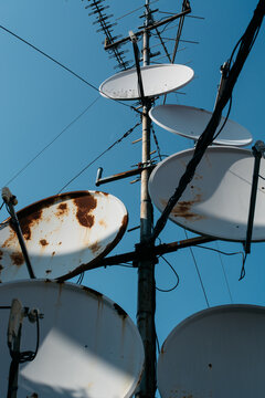 Satellite dishes and antennas on a pylon