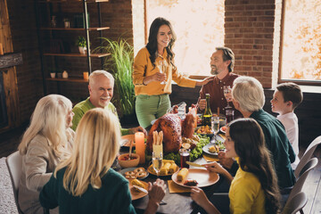 Portrait of nice attractive adorable cheerful family small little kids meeting mom saying toast congratulating harvest festal event occasion at modern loft industrial wooden interior house