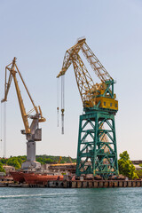 Fototapeta na wymiar Cranes in the cargo port of Sevastopol in Crimea