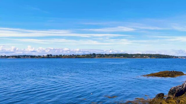 Mackerel Bay in Harpswell Maine showing sea weed, ocean, clouds, 4K