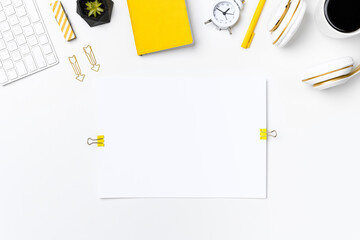 Flat lay workplace desktop with blank paper mockup