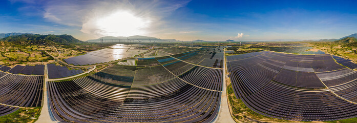 solar energy panels and wind turbine. Drone view