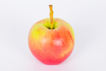 red apple on a white