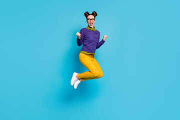 Fototapeta na wymiar Full length profile photo of pretty crazy lady two buns jump high celebrate college graduating excellent degree diploma wear specs shirt pullover pants isolated blue color background