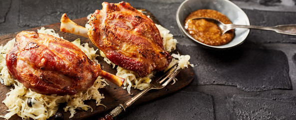 Roasted or grilled Eisbein on sauerkraut