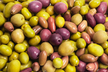 Tasty mix olives background.