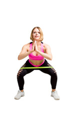 Fototapeta premium Young Fitness woman in training dress. Isolate white background.