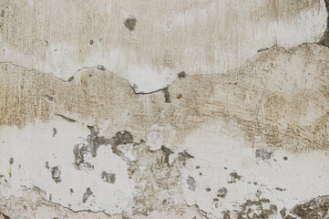 Cracked and peeling paint old wall background.