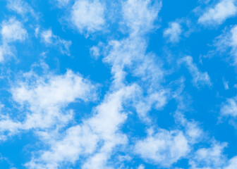 Light clouds in blue sky. Sky with fluffy clouds background
