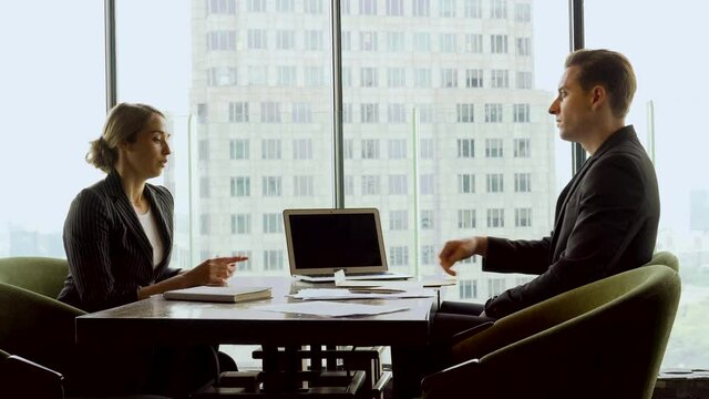 manager sending envelope  dismissal to  female employee . sad businesswoman  get fired by executive  . job flap fired . layoff . loss job