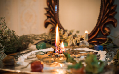 Candle for cleansing a person, magic rituals and wax casting, energy cleansing. Altar of modern witch.
