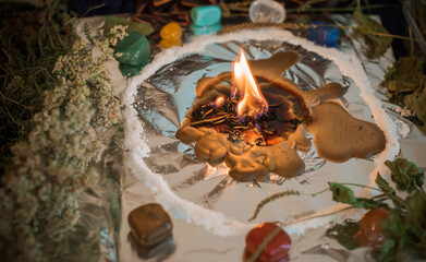 Candle for cleansing a person, magic rituals and wax casting, energy cleansing. Altar of modern witch.
