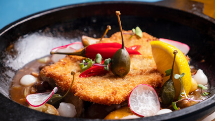 Roasted chicken schnitzel. Macro view. Closeup