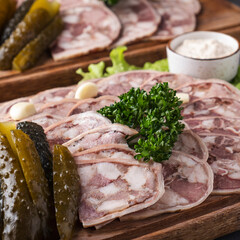 Saltison on a wooden board. Closeup