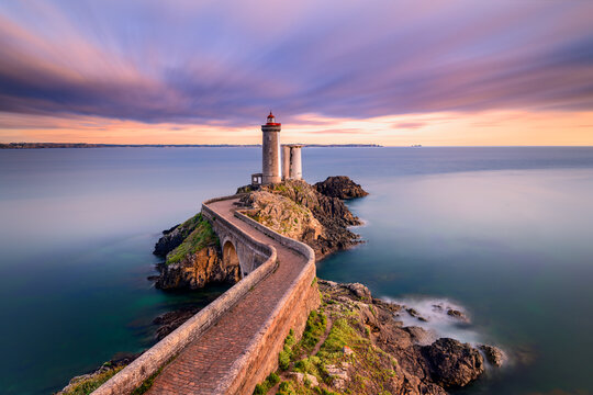 Petit Minou Lighthouse at sunset. It indicates to the boats wishing to go to Brest, the route to follow to enter the harbor. It forms an alignment with the Portzic lighthouse. It also has a red sector