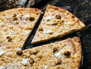 Pizza on a dark background. Pizza photo. 