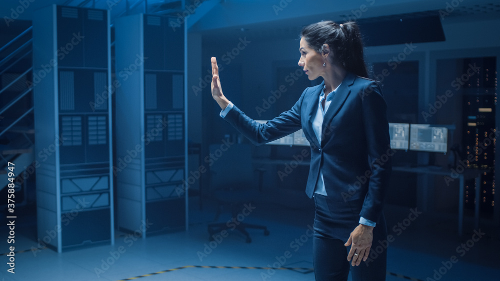 Poster in modern data center research laboratory beautiful confident woman does virtual reality activating 