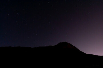 Real Night Sky Stars Background With Natural Colourful Sky Gradient. Sunset, Sunrise Light And Starry Sky. Yellow And Black Colors.
