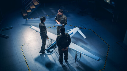 Army Aerospace Engineers Work On Unmanned Aerial Vehicle / Drone. Uniformed Aviation Experts Talk,...