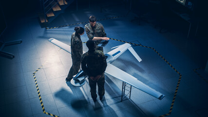 Army Aerospace Engineers Work On Unmanned Aerial Vehicle / Drone. Uniformed Aviation Experts Talk,...