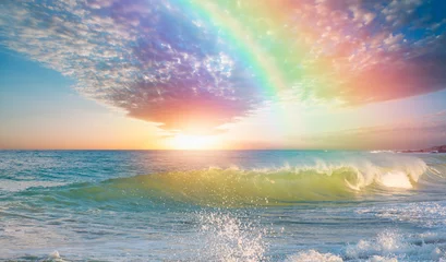 Schöne Landschaft mit türkisfarbenem Meer mit doppelseitigem Regenbogen bei Sonnenuntergang © muratart