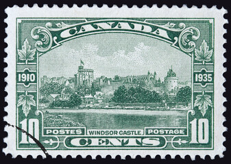 Ottawa, Canda - July 1935:  Canadian stamp showing Windsor Castle in England, issued to commemorate the 25th anniversary of the reign of King George V.